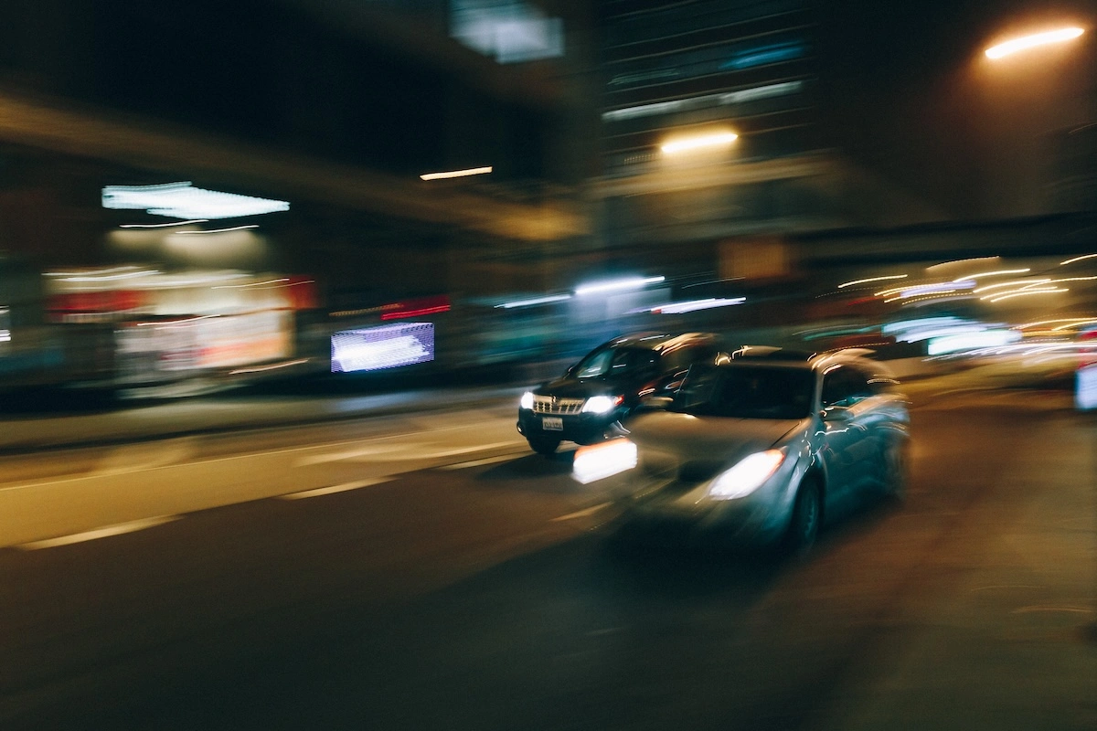 cars in motion at night